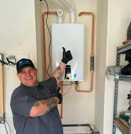 plumber with a tankless water heater