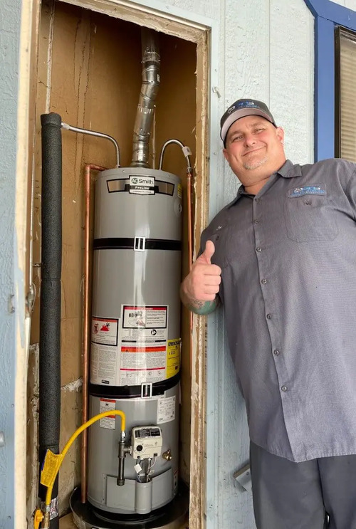 plumber with a water heater